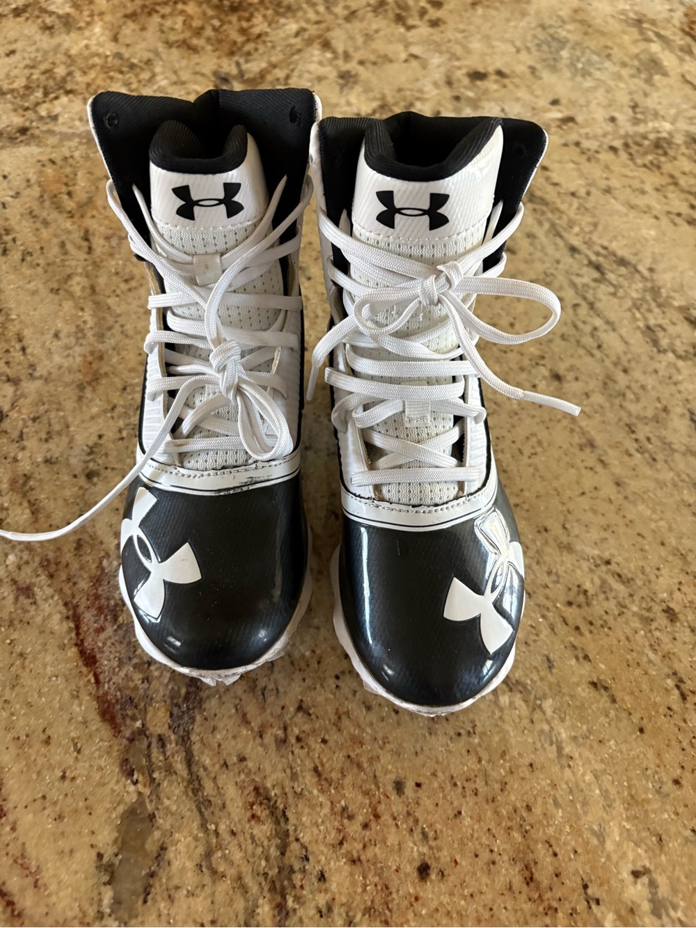 Under Armour Kids Black and White High-Top Football Cleats size 1.5Y